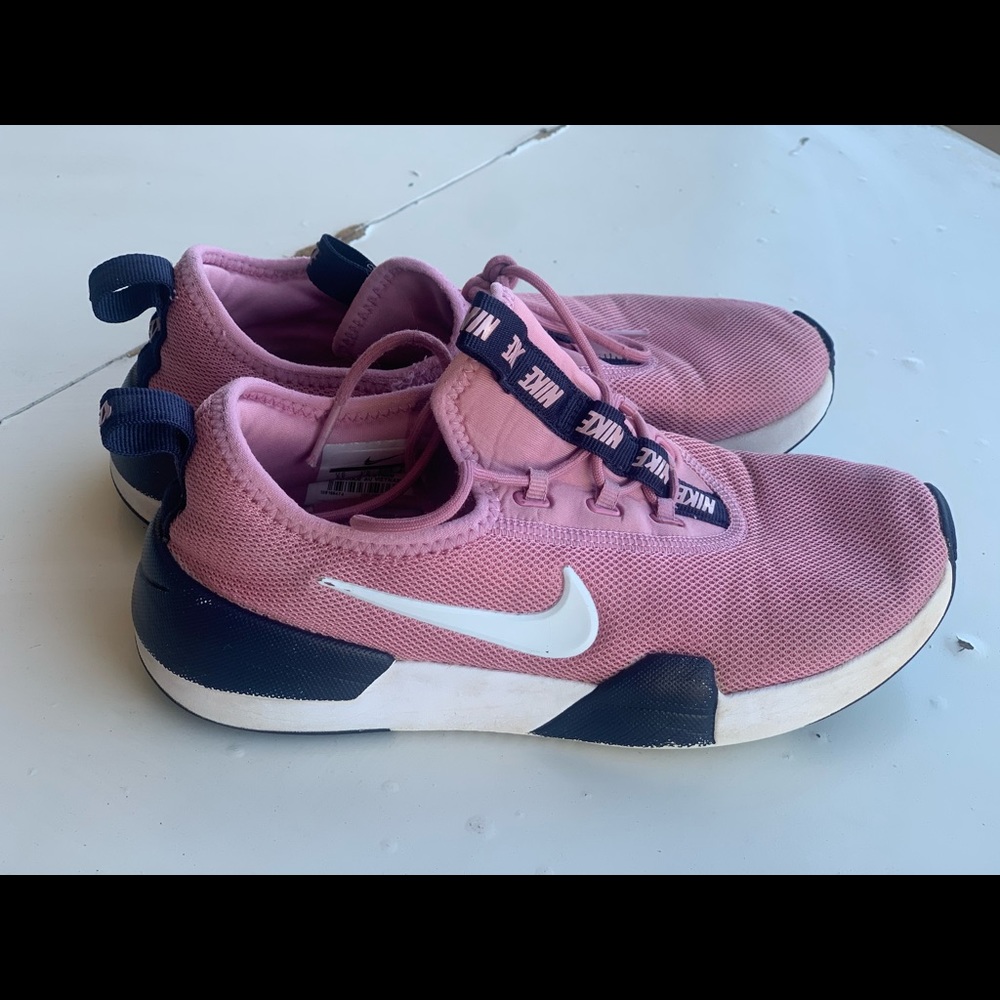 Pink nike running shoes